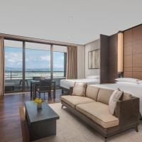 Трехместный (Трехместный семейный номер Делюкс) курортного отеля Grand Hyatt Sanya Haitang Bay Resort and Spa, Санья