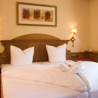 Четырехместный (Четырехместный номер) отеля Huber Hotel Tramserhof, Зее