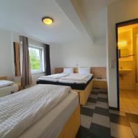 Четырехместный (Четырехместный номер с собственной ванной комнатой) отеля Ambiente by Next Inn, Гамбург