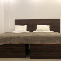 Двухместный (Двухместный номер Делюкс с 2 отдельными кроватями) отеля 7 Suites, Бангалор