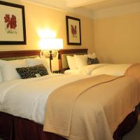Четырехместный (Номер Делюкс с 2 кроватями размера "queen-size") отеля San Carlos Hotel New York, Нью-Йорк