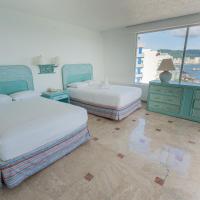 Сьюит (Люкс с видом на море (для 4 взрослых)) отеля Playa Suites Acapulco, Акапулько-де-Хуарес