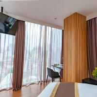 Сьюит (Дизайнерский люкс с бесплатным мини-баром) отеля Bay Hotel Ho Chi Minh, Хошимин