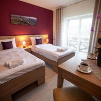 Двухместный (Двухместный номер с двуспальной кроватью и дополнительной кроватью) отеля Rezydencja Pod Ochorowiczówką B&B, Висла