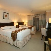 Четырехместный (Суперлюкс с 2 спальнями) отеля Crown Regency Suites Mactan, Мактан