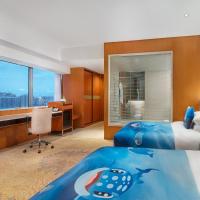 Трехместный (Семейный номер с видом на город) отеля Crowne Plaza Beijing Sun Palace, Пекин