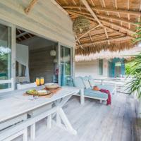 Сьюит (Люкс с кроватью размера «king-size» и видом на сад) отеля Kai Tulum, Тулум