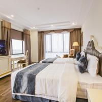 Двухместный (Двухместный номер Делюкс с 2 отдельными кроватями) отеля Khách sạn Minh Phú Diamond Palace, Винь