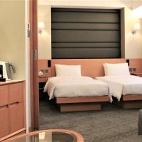 Двухместный (Grand Studio - Twin Bed with open area) отеля South Pacific Hotel, Гонконг (город)