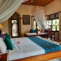 Двухместный (Двухместный номер Делюкс с 1 кроватью и видом на рисовые поля) курортного отеля Alam Jiwa, Убуд