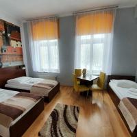 Трехместный (Трехместный номер с ванной комнатой) отеля Hotelik w Centrum, Торунь