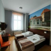 Двухместный (Двухместный номер с 2 отдельными кроватями и видом на город) отеля Hotelik w Centrum, Торунь