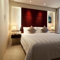 Сьюит (Howard Court Junior Suite A) отеля Howard Johnson Parkland Hotel Dalian, Далянь