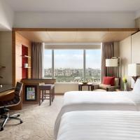 Двухместный (Клубный номер с кроватью размера «king-size») отеля Kerry Hotel Pudong, Шанхай
