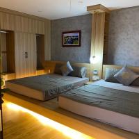 Двухместный (Номер Делюкс с 2 кроватями размера «queen-size») отеля Quiri Hotel, Катба