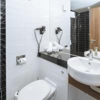 Четырехместный (Номер с 2 кроватями размера «queen-size») отеля Holiday Inn Express Strasbourg Centre, Страсбург