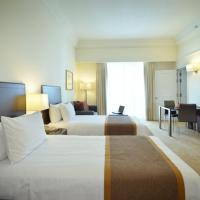 Студио (Двухместный номер-студио с 2 отдельными кроватями (включен завтрак для 2 человек)) апарт-отеля PNB Perdana Hotel & Suites On The Park, Куала-Лумпур