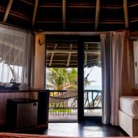 Четырехместный (Номер Делюкс рядом с океаном - Верхний этаж) отеля Villa Las Estrellas, Тулум