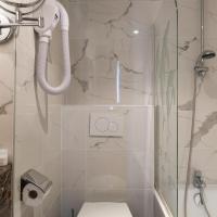 Двухместный (Стандартный двухместный номер с 2 отдельными кроватями) отеля Hôtel Aston, Париж