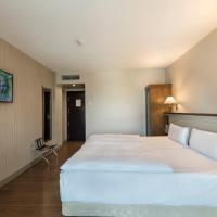 Двухместный (Улучшенный двухместный номер с 2 отдельными кроватями) отеля NH Bucharest, Бухарест