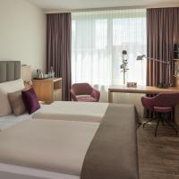 Двухместный (Улучшенный двухместный номер с 1 кроватью) отеля Dorint Hotel Basel, Базель