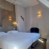 Двухместный (Улучшенный двухместный номер с 2 отдельными кроватями) отеля Hôtel Eiffel Kensington, Париж