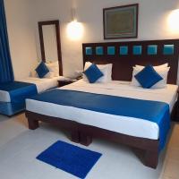 Трехместный (Трехместный номер Делюкс) курортного отеля Pigeon Island Beach Resort, Нилавели