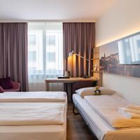 Трехместный (Стандартный трехместный номер) отеля Dorint Hotel Basel, Базель