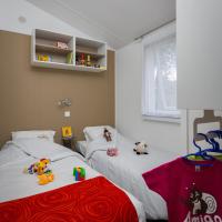 Номер (Mobil-home Palma Clim 4-6 personnes) кемпинга Camping Les Peupliers, Ре