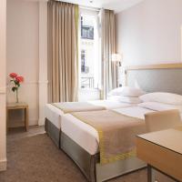 Двухместный (Клубный двухместный номер с 2 отдельными кроватями) отеля Floride-Etoile, Париж