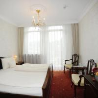 Двухместный (Улучшенный двухместный номер с 1 кроватью) отеля HELIOPARK Bad Hotel Zum Hirsch, Баден-Баден