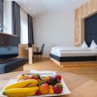 Четырехместный (Улучшенный номер «Плюс») отеля Hotel Grünauerhof, Зальцбург