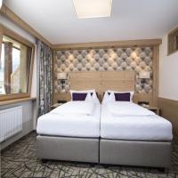 Сьюит (Люкс с 2 спальнями (2-4 взрослых)) отеля Hotel Pramstraller, Майрхофен