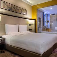 Двухместный (Представительский номер с кроватью размера «king-size») отеля Pullman Qingdao Ziyue, Циндао