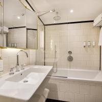 Двухместный (Двухместный номер Делюкс с 2 отдельными кроватями) отеля Hôtel L’Echiquier Opéra Paris - MGallery by Sofitel, Париж