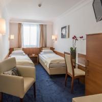 Двухместный (Классический двухместный номер с 2 отдельными кроватями) отеля Hotel Mondschein, Инсбрук