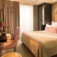 Двухместный (Улучшенный двухместный номер с 1 кроватью) отеля Hôtel Baume, Париж