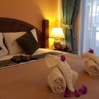 Двухместный (Улучшенный двухместный номер с 1 кроватью) отеля MT Hotel, Пхукет