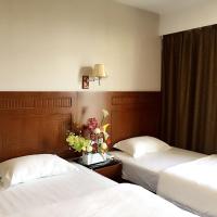 Двухместный (Стандартный двухместный номер с 2 отдельными кроватями) отеля Fan Holiday Hotel, Куала-Лумпур