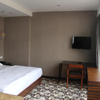 Двухместный (Номер Делюкс с кроватью размера «king-size») отеля Fan Holiday Hotel, Куала-Лумпур