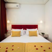 Четырехместный (Номер Делюкс) отеля Hôtel Racine, Марракеш