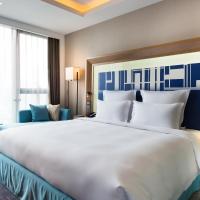 Двухместный (Premier номер с одной двухспальной кроватью) отеля Novotel Ningbo East, Нинбо