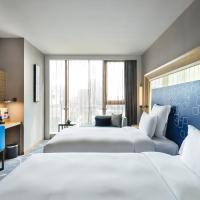 Двухместный (Улучшенный номер с 2 односпальными кроватями) отеля Novotel Ningbo East, Нинбо