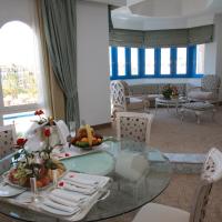 Сьюит (Люкс «Амбассадор» с видом на бассейн) отеля Hasdrubal Thalassa & Spa Yasmine Hammamet, Хаммамет