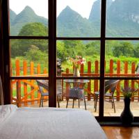 Двухместный (Номер Делюкс с кроватью размера «queen-size», вид на сад) гостевого дома Yangshuo Coco Garden Hotel, Яншо