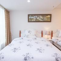 Двухместный (Двухместный номер Делюкс с 2 отдельными кроватями и видом на город) апартаментов Guangzhou Manhattan International Apartment Zhengjia Branch, Гуанчжоу