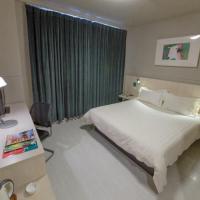 Двухместный (Для граждан материкового Китая – Стандартный двухместный номер A с 2 отдельными кроватями) отеля Jinjiang Inn Shanghai Changzhong Road, Шанхай