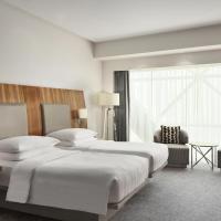 Трехместный (Номер с 2 односпальными кроватями.) отеля Hyatt Capital Gate Abu Dhabi, Абу-Даби