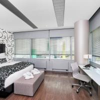 Сьюит (Одноместный Люкс) отеля Innside by Meliá Düsseldorf Hafen, Дюссельдорф