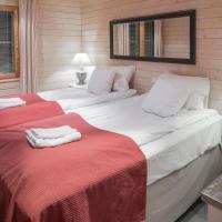 Номер (Шале Делюкс с сауной) отеля Lapland Hotels Ounasvaara Chalets, Рованиеми